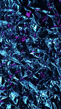 blue and purple tinfoiled material is shown in this image