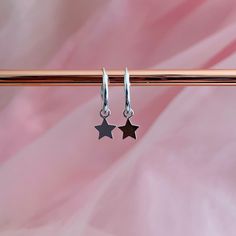 "Silver mini star charm hoop earrings | Gold star hoops | Rose gold mini hoops | Tiny hoop earrings. Simple and casual everyday mini hoop earrings with star dangle charm. The tiny charm is removable, that means that you can wear it by itself or exchange with another charm. These sets of mini hoops are the perfect jewelry to\" Mom and Me\" matching jewelry. Metal: 925 Sterling silver. ( 925 stamped ) Weight: 0,60g. Measurements: 6mm x 6mm. Finishing: Silver, 18k Gold or Rose gold. All of them wit Rose Gold Hoop Earrings, Hoop Earrings Silver, Tiny Hoop Earrings, Tiny Charm, Small Hoop Earrings, Dangle Hoop Earrings, Mini Hoop Earrings, Hoop Earrings Gold, Jewelry Metal