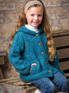 She will love this hooded cardigan with lots of buttons and roomy pockets, and you'll love that it's quick to make! Knit with 4 (4, 5, 6) hanks of Berroco Inca Tweed yarn at a gauge of 15 sts and 21 rows per 4" using U.S. size 10/6mm straight an... Annie's Crochet, Kids Knitting Patterns, Tweed Yarn, Creative Knitting, Quick Knits, Designer Baby, Knitting Magazine, Girls Cardigan, Hooded Cardigan