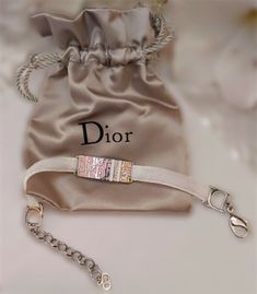 (eBay) ❤️ DIOR New Trotter Number 2 pink bracelet vintage,Jonh Galliano era! 2000s Dior, Baby Jewellery, Pink Choker, Pink Monogram, Dior Makeup, Butterfly Bracelet, Cosmetics Bag, Baby Jewelry, Trotter