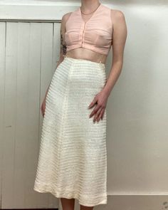 "An authentic vintage ribbon skirt. side zip fastener.  era : 1940s material : rayon ribbon color : aged white condition : excellent! little to no signs of age and wear size :  xsmall - please compare measurements below actual garment measurements : waist : 25\" hip : up to 38\" length : 30.5\" - - - - - - - - - - - - - - - - - - - - - - - - - - - - - - - - - - - - - - - -  INTERNATIONAL SHIPPING AVAILABLE UPON REQUEST Craft Union does NOT accept returns or exchanges, all items are FINAL SALE Please consider the following prior to placing an order : Because measurements are provided, Craft Union does NOT grant refund/exchange requests if an item does not fit. We are always happy to assist interest buyers with any size/fit concerns using the \"ask a question/message\" feature! Most vintage Vintage Beige Party Skirt, Vintage Full Skirt Bottoms In Beige, Vintage Beige Full Skirt Bottoms, 1950s Fitted Skirt, Vintage Cream Lined Skirt, New York Outfit, Ribbon Skirt, Ribbon Skirts, Vintage Ribbon