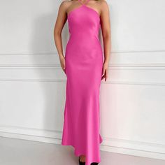 This Women's Summer Sexy Sleeveless Halter Satin Dress is made from 100% polyester, ensuring softness, comfort, and skin-friendliness. The simple halter design is both stylish and sexy, perfectly showcasing feminine charm. Ideal for everyday wear or vacations, this dress is also perfect for festivals, Valentine's Day, and weddings, adding elegance and confidence to your look. Elegant Pink Satin Halter Dress, Stretch Satin Sleeveless Halter Dress, Summer Stretch Satin Halter Dress, Pink Satin Sleeveless Halter Dress, Pink Halter Neck Dress For Evening, Pink Satin Backless Halter Dress, Chic Pink Dress With Strappy Back, Pink Satin Sleeveless Party Dress, Chic Pink Satin Sleeveless Dress