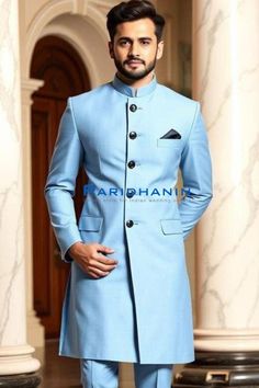 This elegant light blue Achkan suit blends tradition with modern sophistication. Featuring intricate button detailing and a sleek mandarin collar, the ensemble is perfect for formal events or weddings. Made from high-quality fabric, it ensures both comfort and style, offering a regal yet contemporary look for the discerning gentleman. Care Instructions : Dry Clean Only Accessories like Safa ,Mojri, Mala Not included Light Blue Sherwani, Blue Sherwani With Naqshi Long Sleeve, Blue Long Sleeve Sherwani With Dabka Details, Blue Fitted Sherwani With Cutdana, Semi-stitched Blue Sherwani With Cutdana, Wedding Suits Men, Mandarin Collar, Wedding Men, Wedding Suits