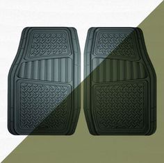 two black floor mats with braiding on the front and back, one is green