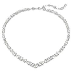 Embrace the pure refinement of this dazzling Mesmera necklace. The luminous design is made with a string of eye-catching Swarovski Zirconia on a rhodium plating setting in a surprising mix of cuts and sizes. For extra luxury, the elongation is completed with a lobster closure and a scattering of striking Swarovski Zirconia. Gift this to a loved one for a style to be worn again and again. Swarovski Millenia Necklace, Elegant Jewelry Silver, Crystal Necklace Designs, Hogwarts Style, Charms Pandora, Necklace Swarovski, Swarovski Crystal Jewelry, Swarovski Necklace, Luxury Necklace