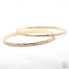 14k Gold Bangle Bracelet, perfect for someone who love Hawaiian tropical flower & scroll design. Made in Hawaii. Check out our latest bangle collection today. Engraved Rose Gold Bangle Bracelet, Rose Gold Engraved Bangle For Wedding, 14k Gold Bangle With Intricate Design For Anniversary, Anniversary 14k Gold Bangle With Intricate Design, 14k Gold Bangle With Intricate Design As Gift, Dainty Engraved Gold Bracelet For Wedding, Simple Gold Bangle, 14k Gold Bangle Bracelet, Rose Gold Bangle Bracelet