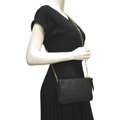 Louis Vuitton Double Zip Pochette Empreinte Bag Item Details: Designer: LOUIS VUITTON Retail: N/A Model: Double Zip Pochette Style: Shoulder / Crossbody Bag Material: Monogram Empreinte Leather Color: Black Made: Spain Date Code: Chip Measurements: W 8.5" D 1.5" H 5.25" Accessories: Dust Bag. Condition Detail: Good - The Item shows signs of use, possibly including rubbed corners, moderate leather tanning, some inside stain marks, and tarnishing hardware. See the listing description for details. Double Zip Pochette Louis Vuitton, Louis Vuitton Three Piece Pochette, Multi Pochette Louis Vuitton, Zippy Wallet Louis Vuitton, Louis Vuitton Multi Pochette Empreinte, Black Louis Vuitton, Gold Ounce, Tanning, Black Cross Body Bag