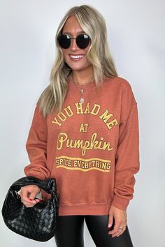 Details: Indulge in cozy comfort with our Pumpkin Spice Everything Graphic Pullover. Made from garment-dyed fabric, this long sleeve sweatshirt boasts an oversized fit and features the playful phrase "You Had Me At Pumpkin Spice Everything". Perfect for any fall enthusiast, you won't be able to resist snuggling up in this top. (Pumpkin spice latte not included.) - "You Had Me at Pumpkin Spice Everything" graphic - Long sleeves Content: 50% COTTON 50% POLYESTER Size + Fit Model is 5'4" and wearin Trendy Soft-washed Sweatshirt For Fall, Fall Long Sleeve Soft-washed Sweater, Relaxed Fit Letter Print Fall Sweater, Relaxed Fit Sweater With Letter Print For Fall, Fall Sweater With Letter Print And Relaxed Fit, Soft-washed Sweater For Fall, Soft-washed Fall Sweater, Trendy College Sweats For Fall, Graphic Print Sweatshirt For Fall Loungewear