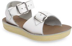 Summer Sport Sandals With Adjustable Strap, T-strap Footbed Sandals For The Beach, Summer T-strap Sandals With Buckle Closure And Open Toe, White Sport Sandals With Buckle For Summer, Summer Beach Sport Sandals With Buckle Closure, Vacation T-strap Closed Toe Sandals With Buckle, Closed Toe T-strap Sandals With Buckle For Vacation, Beach Sport Sandals With Buckle Closure And Round Toe, White Closed Toe T-strap Sandals With Buckle