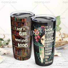 two stainless steel tumblers with books on them