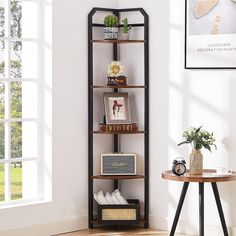 a corner shelf in the corner of a room with pictures on it and bookshelves