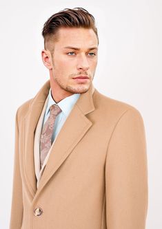 Classically elegant, this sharp Camel Wool Classic Overcoat is custom made from premium melton wool and designed to be a staple in any wardrobe. Cool and versatile, this timeless overcoat will provide reliable warmth and style for years to come. Camel Wool Coat, Wool Overcoat, Wool Fabric, Wool Coat, Camel, Custom Made, Wool, Wardrobe