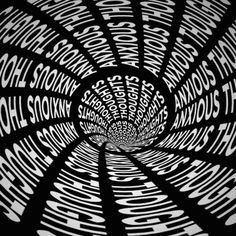 the inside of a black and white circular object with words written in different languages on it