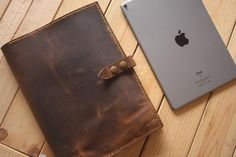 an ipad case sitting on top of a wooden table