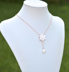 "2018 Collection, MORNING HEIRLOOM Y NECKLACE COLLECTION Featuring hand sculpted white Gardenia and tear drop pearl necklace. Details : - Gardenia made from baking polymer clay. -Flower size approx : 22-23mm - Flower glued on metal plated over brass filigree. - Entire length ; 16 inches + 2 \" extender. Finish with lobster clasp. - Chain finish available in silver plated, antiqued brass, gold and rose gold. - Sterling silver and gold filled chain available with additional cost, ( the filigree in White Flower Pendant Jewelry With Adjustable Chain, White Flower Shaped Necklace With Adjustable Chain, Elegant White Flower Necklace With Adjustable Chain, Pearl Chain Jewelry With Flower Pendant, White Teardrop Pendant Jewelry With Pearl Chain, White Pendant Necklace With Flower Charm, White Pearl Flower Pendant Necklace, Pearl White Flower Jewelry With Pearl Charm, Pearl White Flower-shaped Jewelry With Pearl Charm