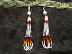 Authentic Beautiful Native American Indian Jewelry Navajo Hand Beaded Long Dangle Earrings. Great for a gift❤️ Handcrafted by Navajo Artist R. Sellers These beautiful earrings are 4.75" in length and 1" in width. Southwestern Dangle Beaded Earrings, Silver Southwestern Beaded Earrings With Ear Wire, Southwestern Silver Beaded Earrings With Ear Wire, Southwestern Adjustable Dangling Bead Earrings, Southwestern Silver Beaded Earrings, Silver Southwestern Beaded Earrings, Southwestern Adjustable Silver Beaded Earrings, Adjustable Southwestern Beaded Earrings, Navajo Earrings