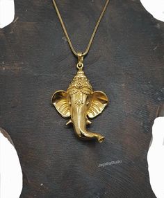 HANDMADE Statement unique Ganesh necklace. Known to Tibetan Buddhist as Ganapati. Believed to be the remover of obstacles, god of the beginnings. Elephants are also traditionally considered a symbol of good luck, wisdom, fertility, and protection. Wearing or placing the image of the elephant with its trunk raised is thought to attract good fortune and positive energy. With beautiful details and Intricate work. Handmade with high quality jewelry brass nickel free. Aprox Lenght of pendant: 6.4 cm Spiritual Necklaces For Puja And Festivals, Spiritual Necklace For Puja And Diwali, Spiritual Necklace For Diwali Puja, Spiritual Necklace With Latkans For Diwali, Spiritual Necklaces With Latkans For Diwali, Heavy Spiritual Temple Necklace As Gift, Heavy Spiritual Temple Necklace Gift, Bronze Spiritual Necklaces For Rituals, Spiritual Necklaces For Navratri