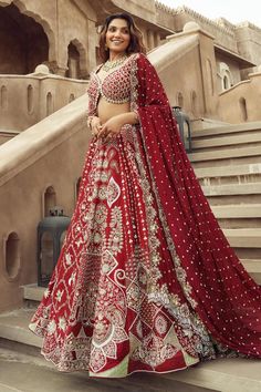 Scarlet red flared cancan lehenga with mughal bloom garden embroidery using cut dana, pearls, tikki, sequin highlights. Paired with long sleeves cut work detail sweetheart neckline padded blouse with dangling teardrop moti, sequins, cut dana jaal, tonal beads embellishments and white lace border dupatta with red sequin flora embroidered dupatta.
Components: 4
Pattern: Embroidery
Type Of Work: Cutdana, Pearls, Tikki, Sequins
Neckline: Sweetheart Neck
Sleeve Type: Long
Fabric: Silk, Organza
Color: Red Anarkali Sharara For Reception, Red Gown For Navratri Reception, Red Anarkali Sets For Reception, Red Gown For Reception And Navratri, Red Gown For Reception At Navratri, Red Cutdana Gown For Eid, Red Sets With Sheer Dupatta For Navratri, Red Floor-length Sets For Reception, Red Cutdana Choli For Eid