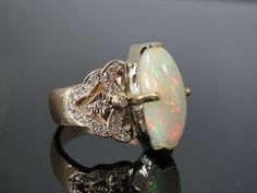 !!!!!!!!!!!!!! Large Rose Gold and Fine Opal Cocktail Ring with by MSJewelers, $2485.00 Heirloom Rose Gold Oval Opal Ring, Classic Rose Gold Opal Ring, Opal Ring Gold, Cocktail Ring, Opal Rings, Cocktail Rings, Statement Rings, Opal, Rose Gold