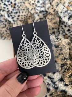 These large brushed silver plated filigree flower teardrop dangle earrings are finished with your choice of sterling silver balled ear wires or lever backs.  Boho chic earrings that are perfect for everyday. They measure approximately 2.25" from end to end. You may also like to check out more of my filigree jewelry here: https://etsy.me/2Tk8TYE You may also like to check out more of my earrings here: http://etsy.me/2oDJlWy Free first class USPS shipping within the USA. Flower Earrings Silver, Boho Chic Earrings, Silver Flower Earrings, Filigree Jewelry, Teardrop Dangle Earrings, Chic Earrings, Earrings Statement, Silver Filigree, Floral Earrings