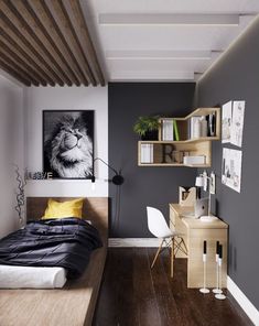 a bedroom with grey walls and wood floors