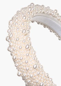 The Bailey Headband is blanketed in luminous pearls from end to end, creating a regal finishing touch. The height of this pearly headband further magnifies the Baily's wow-factor. Each headband is hand-embroidered in our Brooklyn studio, and the craftsmanship is immediately evident when worn. Dimensions: 6.5 x 6 x 2 inches; Weight: 70g Jennifer Behr Headband, Luxury Hair Accessories, Jennifer Behr, End To End, Pearl Headband, Luxury Hair, Blue Bridesmaids, Velvet Material, Swarovski Pearls