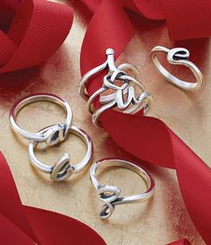 James Avery Delicate Heart Knot Ring Sterling Silver Rings With Polished Finish For Valentine's Day, Valentine's Day Sterling Silver Rings With Polished Finish, Elegant Sterling Silver Stackable Rings With Open Heart, Classic Silver Open Heart Rings, Silver Open Initial Ring For Valentine's Day, Silver Initial Open Ring For Valentine's Day, Silver Open Ring For Valentine's Day, Sterling Silver Open Heart Stackable Promise Rings, Adjustable Silver Heart Ring Fine Jewelry