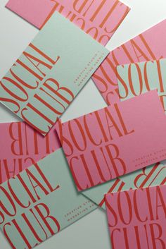 pink and green business cards with the words social club printed on them, all in different colors