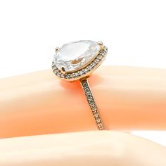 Authentic PANDORA Rose ™ Radiant Teardrop Size 7 14K Rose Gold Plated Ring With Clear Zirconia - 186251CZ. This stunning 14K Rose Gold Plated Statement Ring with teardrop shaped stone will look gorgeous on somebody's ring finger. A statement piece for sure. Ring is pre-owned and in great condition. This ring looks fantastic on its own or combined with nearly any other Pandora stacking ring to create a design that is uniquely you. All my jewelry items come in a black velvet jewelry pouch or gift Pear-shaped Rose Gold Ring For Proposal, Rose Gold Teardrop Diamond Ring, Rose Gold Teardrop Ring For Proposal, Rose Gold Teardrop Diamond Ring For Wedding, Rose Gold Teardrop Jewelry For Proposal, Rose Gold Teardrop Wedding Ring With Prong Setting, Rose Gold Pear-shaped Rings With Rose Cut Diamonds, Pear-shaped Rose Gold Ring With Rose Cut Diamonds, Pear-shaped Rose Cut Diamond Rings In Rose Gold