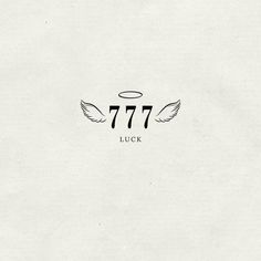 a white paper with the words 777 and an angel's wing on it