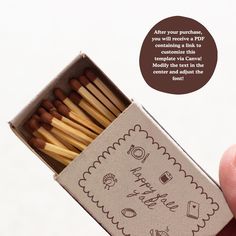 someone is holding a match box full of matches