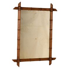 a mirror that is made out of wood