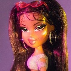 a close up of a barbie doll with long hair and sunglasses on her head,