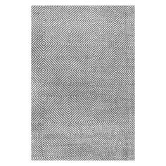 a gray rug with diamond shapes on it