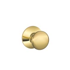 a gold door knob on a white background