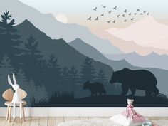 a bear and her cub in the mountains wall mural