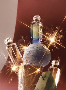 an assortment of bottles with sparklers in the background