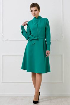 Emerald Green Dress by TAVROVSKA Long Sleeve Fit Flare Dress Green Midi Dress For Semi-formal Occasions, Green Semi-formal Midi Dress, Formal Dress With Stand Collar And Buttons, Formal Stand Collar Dress With Buttons, Green Knee-length Semi-formal Midi Dress, Green Buttoned Midi Dress For Party, Stand Collar Dress With Button Closure For Work, Workwear Dress With Stand Collar And Button Closure, Elegant Green Dress With Button Closure