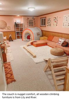 a living room filled with lots of furniture next to a wall mounted tv on top of a wooden shelf