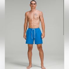 The Deep End Beckons. These Streamlined Swim Shorts Are Designed With Thoughtful Details That Make Them Perfect For A Day In (Or Out) Of The Pool. Designed For Swim Water-Repellent Abrasion-Resistant Breathable Mesh Fabric Liner With Xtra Life Lycra For Chlorine Resistance Classic Fit, 7” Length (Inseam) Streamlined Fit That Gives Glutes And Thighs Breathing Room Blue Activewear For Beach Season Vacation, Sporty Blue Activewear For Vacation, Athleisure Activewear For Vacation, Blue Short Length Activewear For Vacation, Blue Short Activewear For Vacation, Blue Lightweight Casual Activewear, Casual Lightweight Blue Activewear, Blue Activewear For Beach Season In Short Length, Summer Blue Sports Activewear