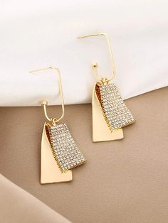 Make a statement with these eye-catching What Do You Want Earrings. Designed with sophistication in mind, these geo drop earrings will be the perfect accessory for your next date night. Crafted with elegance, these classy earrings will give your look a unique flair. Height 2.4"Width 0.6" Due to monitor differences, actual colors and/or patterns may vary slightly from online. Modern Metal Teardrop Earrings For Party, Modern Chandelier Drop Earrings For Party, Chic Teardrop Earrings For Party, Chic Geometric Earrings For Party, Elegant Geometric Metal Hoop Earrings, Modern Geometric Earrings For Party, Modern Geometric Party Earrings, Chic Crystal Drop Earrings, Modern Drop Earrings For Party