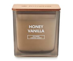 a jar of honey vanilla soy candle on a white background