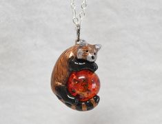 IMPORTANT: Due to a surge in holiday orders I currently have a 2-3 week waiting period for all orders before I can ship them. Please take this into account before ordering as unfortunately I am not able to ensure delivery of an item before 2-3 weeks. I am very sorry for any trouble. ----------------------------- A perfect gift for yourself or the red panda lover in your life! This dashing double sided red panda was hand sculpted from polymer clay, painted with acrylic paints and metallic rub, th Panda Necklace, Ladybug Funny, Panda Gifts, Red Pandas, Very Sorry, Cute Polymer Clay, Miraculous Ladybug Funny, Funky Jewelry, Colored Gems