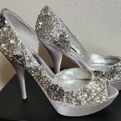 Brand: Nina Style: Sadi Size: 10 Color: Royal Silver Nib - Never Worn! Perfect Condition. Perfect Wedding Or Event Shoes Beautiful Satin Platform Heels. Embellished With Sequins And Beading. Detailed And Eye-Catching! Silver Round Toe Wedding Shoes For Spring, Embellished Heels For Gala And Party Season, Sequined High Heel Evening Wedding Shoes, Silver Sequined Heels For Wedding, Embellished Shoe Clips For Prom, Silver Round Toe Wedding Shoes For Party, Sequin High Heel Wedding Shoes For Evening, Silver Closed Toe Wedding Shoes For Spring, Evening Wedding Shoes With Sequins And High Heel