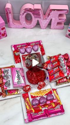 valentine's day candy and candies laid out on a table