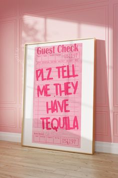 a pink poster with the words pizza tell me they have tequila on it in front of a pink wall