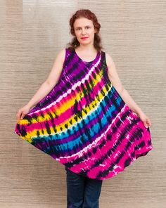 "Tie dye plus size tunic/dress in vibrant colors. Soft flowing fabric (100 % rayon). Can also be worn as a maternity dress/tunic. Asymmetric hem, free size (can fit up to 5XL). Excellent vintage condition (never worn). Approximate dimensions:   Width: bust - 63\" (160 cm) max Length: 39\" (100 cm) max   You will receive the exact dress from the photos. Please remember all displays show colours a little differently! Please, consider that the fabrics are vintage, so small flaws are normal and not Flowy Hand Dyed Festival Dresses, Flowy Tie-dye Dress For Festival, Flowy Hand Dyed Dresses For Festivals, Colorful Flowy Bohemian Dress, Flowy Bohemian Colorful Dresses, Multicolor Hand Dyed Summer Dress, Spring Multicolor Hand Dyed Dresses, Hand Dyed Multicolor Summer Dress, Multicolor Hand Dyed Bohemian Dress