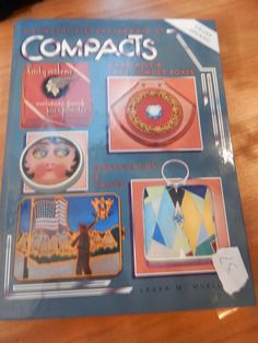 the cover of compacts magazine sitting on a wooden table next to a computer mouse