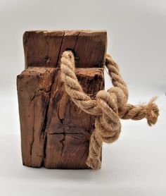 a piece of wood with rope tied around it