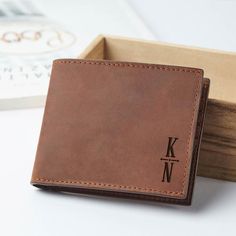 This wallet is engraved with the initial(s) or name on the front side and personalized with any custom message/name/date on the inside, making a perfect gift that will be cherished for years to come.This wallet is made from high-quality pull-up GENUINE leather. This  leather will develop a vintage looking-used look with time (also known as leather patina). It will adopt color variations and scratches over time - this is characteristic of pull-up GENUINE leather and not product defectsITEM INFOMa Classic Bifold Wallet With Engraved Logo, Personalized Classic Leather Wallets, Classic Personalized Leather Wallets, Personalized Rectangular Leather Wallet, Personalized Leather Trifold Wallet, Personalized Brown Leather Trifold Wallet, Personalized Rectangular Trifold Wallet, Classic Personalized Wallets, Bifold Wallet With Engraved Logo As Gift